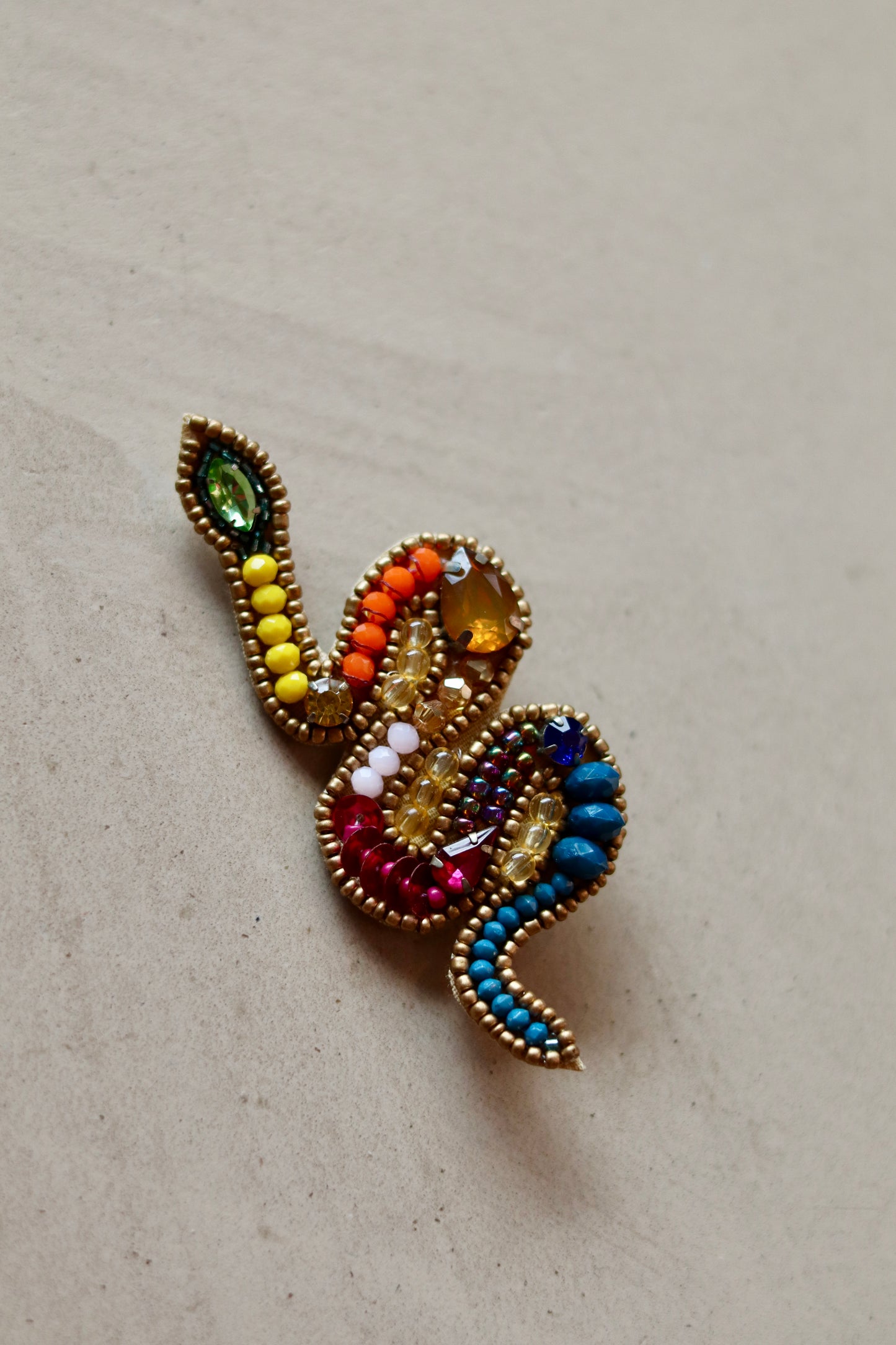 Broche Serpi