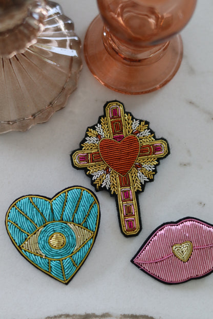 Broche Tira
